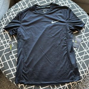 Nike running shirt. Brand new!! Size Large. 100% polyester.